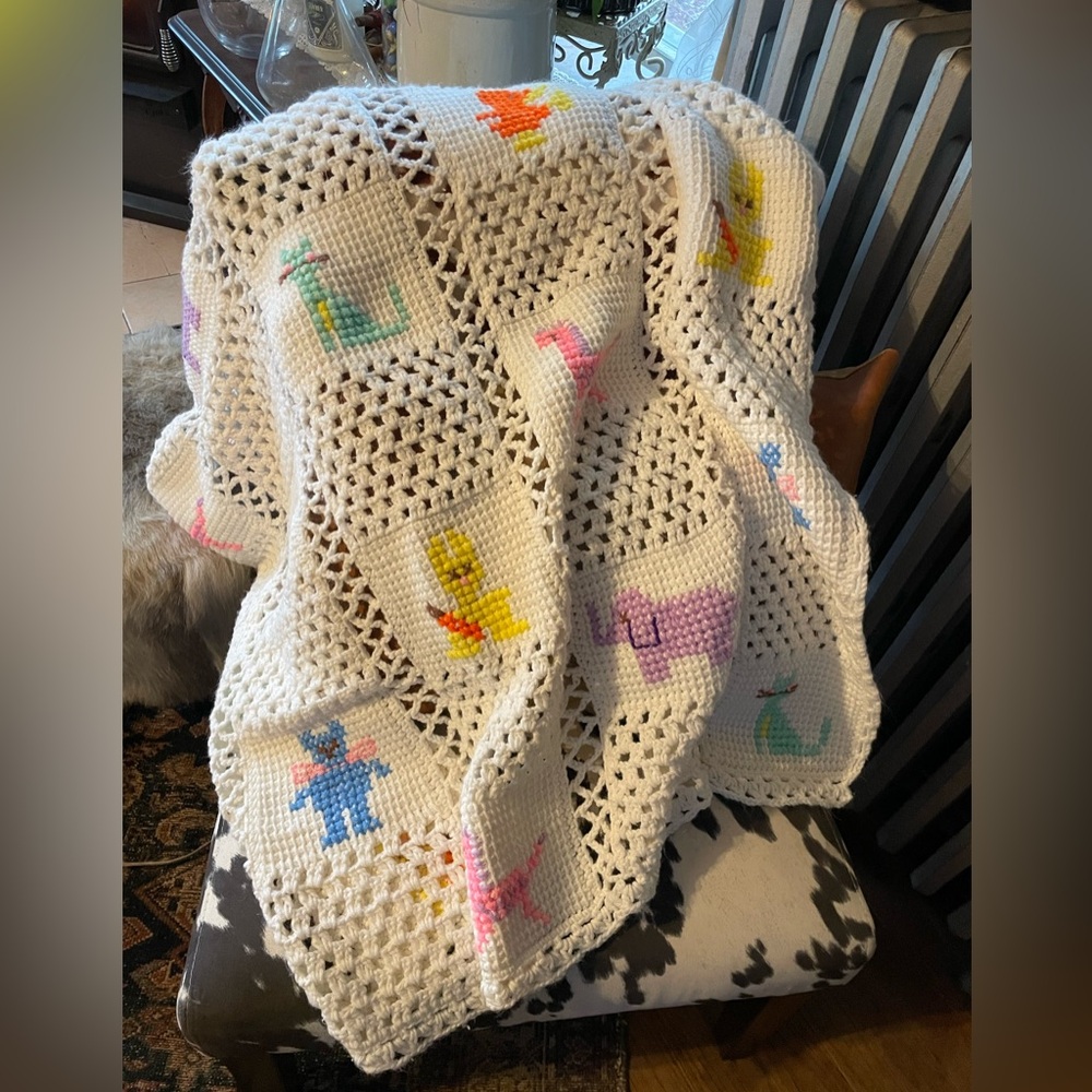 Handmade White Crochet Animal Throw Blanket with Pastel Accents